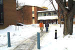 Two students walking on Wilfrid Laurier University campus
