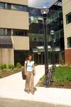 Woman standing in front of the Peters Building, Wilfrid Laurier University