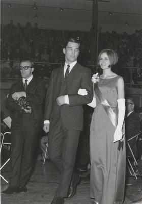 Miss Canadian University Queen Pageant contestant and her escort