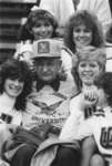 Earle Shelley and cheerleaders at Homecoming 1984 football game