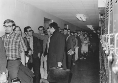 People standing in line for Winter Carnival tickets, 1968