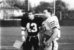 Two football players receiving the Ray Owens Memorial Awards