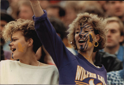 Two women at Wilfrid Laurier University football game