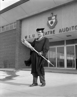 Glenn Carroll holding mace