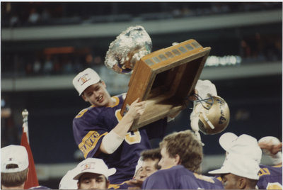 Bill Kubas holding the Vanier Cup