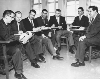 Glenn Carroll and students in classroom