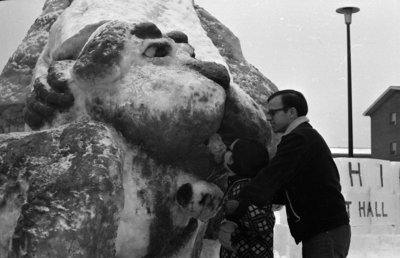 Students looking at snow sculpture at Waterloo Lutheran University Winter Carnival 1968