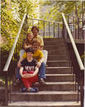 Four people sitting on outdoor stairway, Wilfrid Laurier University