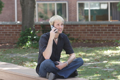 Wilfrid Laurier University student using cell phone