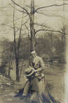 Wilfrid Schweitzer sitting on a tree stump