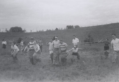 Potato sack race at picnic, Evangelical Lutheran Church of the Redeemer, Montreal, Quebec