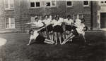 Women gymnasts in front of Willison Hall