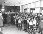 Group standing in Arts Building, Waterloo College