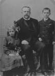 Reverend Guenther Brackebusch and two children
