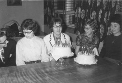 Waterloo Lutheran University Choir members with birthday cakes