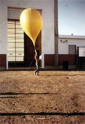 Researcher with weather balloon