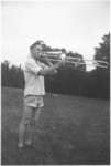 Man playing a trombone, Camp Edgewood, 1947