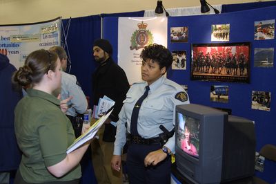 RCMP representative and student at 2002 Career Fair