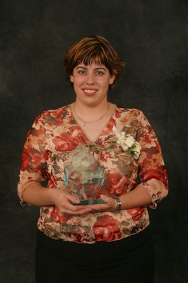 Andrea Harding receiving the student alumna of the year award, 2003