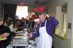 David McMurray serving staff at seasonal lunch, 2001