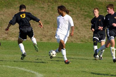 Joel Abwunza during men's soccer game, 2003