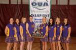 Women's lacrosse team with championship banner and trophy, 2006