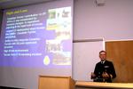 Commodore Jean-Pierre Thiffault giving guest lecture, 2002