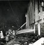 Fire fighters using hoses at St. John's Lutheran Church, Waterloo, Ontario