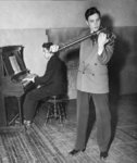 Stanley Bowman playing violin accompanied by Erich Schultz on piano