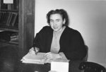 Marion Axford seated at desk