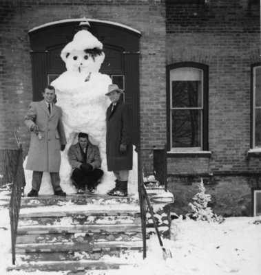 Snowman blocking main entrance to Conrad Hall, Waterloo College