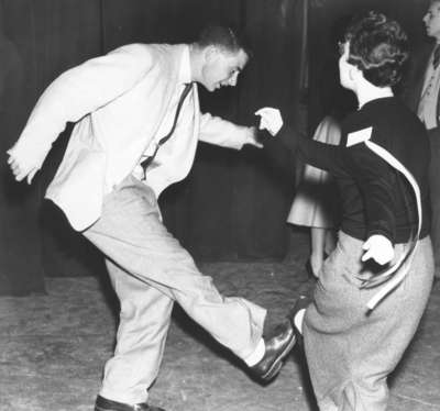 Man and woman dancing at Waterloo College Alumni Reunion, 1955