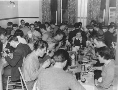 Waterloo College students eating a meal