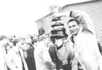 Waterloo Lutheran University basketball coach Howard "Tex" Lockhart with national championship trophy