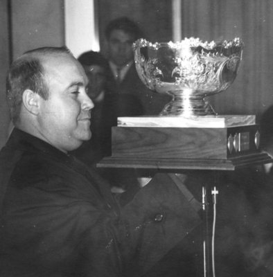 Tuffy Knight holding the Atlantic Bowl trophy