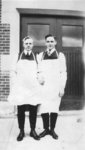 Two Waterloo College School students standing in front of Willison Hall