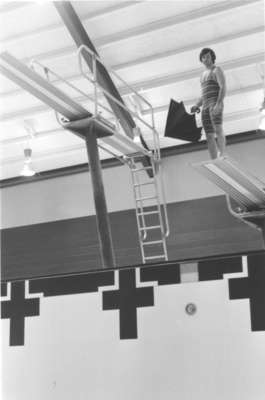 Ian Smith standing on diving board