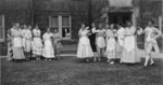 Women standing in front of Willison Hall, Waterloo College