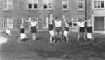 Women gymnasts in front of Willison Hall
