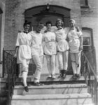 Five female Waterloo College students during initiation week, 1955