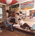 Two male students in residence room