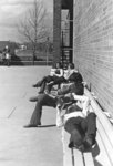 Students on benches, Waterloo Lutheran University