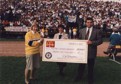 Donation presentation at Wilfrid Laurier University Homecoming 1992