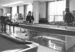 Students playing pool in Student Union Building, Waterloo Lutheran University