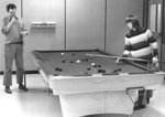 Men playing pool in Student Union Building, Waterloo Lutheran University