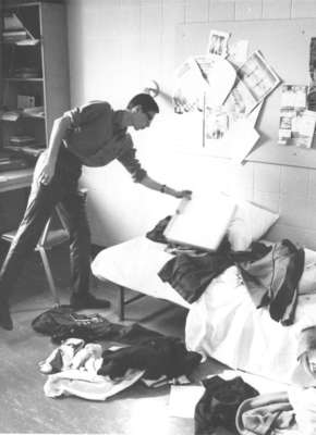 Man in residence room, Waterloo Lutheran University