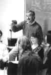 Robert Basso and students in classroom