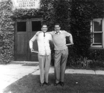 Two students in front of Willison Hall, Waterloo College