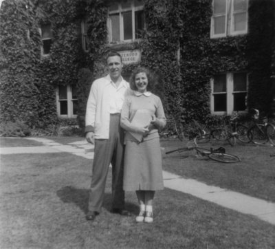 Two students in front of Willison Hall, Waterloo College