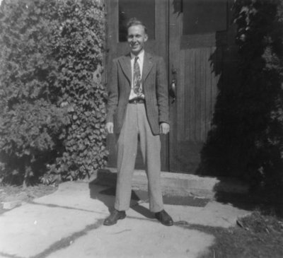 Student in front of Willison Hall, Waterloo College